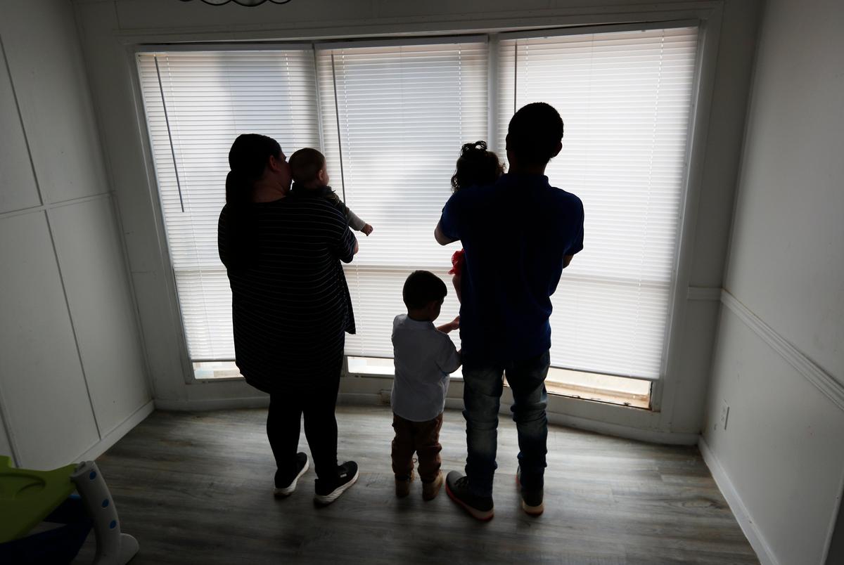 Jose Alvaro (his first and middle name), his wife Ashley, children 6-month old Jose, 1-year  old Arrceli and 4-year-old Antonio at their home near Lubbock, Tx. on Tuesday, January 28, 2025. Jose Alvaro is in danger of being deported and working with an attorney to stay home with his family.