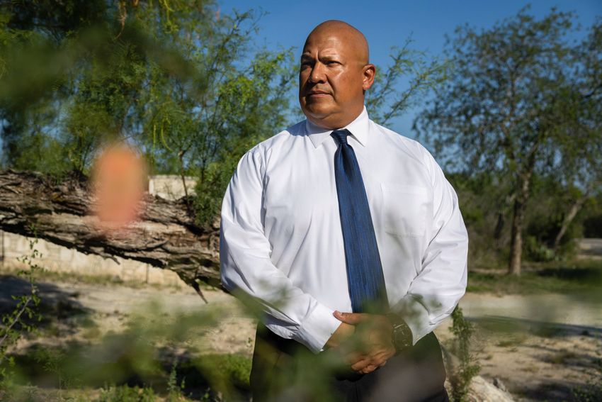 Uvalde school police Chief Pete Arredondo stands on a dirt road on the outskirts of town on June 8, 2022.