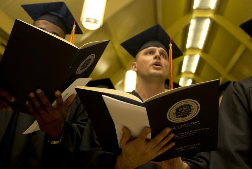 Graduate Lloyd E. Gregg sings a hymn during the commencement ceremony for the first graduating class of the Southwestern Baptist Theological Seminary program. Collectively, Saturday’s graduates earned a 3.7 grade-point average in the program.