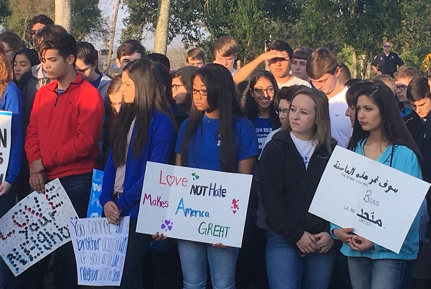 Students at St. Joseph's High School in Victoria, Texas gather near the town's fire-ravaged mosque to show support for the local Muslim community during a Feb. 1, 2017 ceremony.