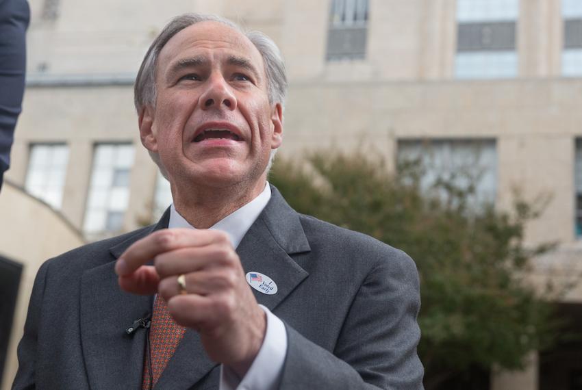 Gov. Greg Abbott speaks with reporters after voting early in the constitutional amendment election Wednesday at the Travis County Courthouse. Abbott discussed the state's recent move against Planned Parenthood and whether he plans to endorse any candidate in the Republican race for the White House.