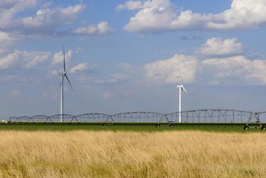 An irrigation system on a farm field near the High Plains town of Ralls, about 30 miles east of Lubbock, on Wednesday, June 22, 2022. Like much of Texas, the High Plains and Panhandle are facing drought conditions and extraordinary heat.