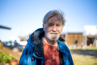 David Wilshusen, 69, stands outside his home in Houston County, Texas on on Wednesday, November 30, 2022. (Emil Lippe for The Texas Tribune)