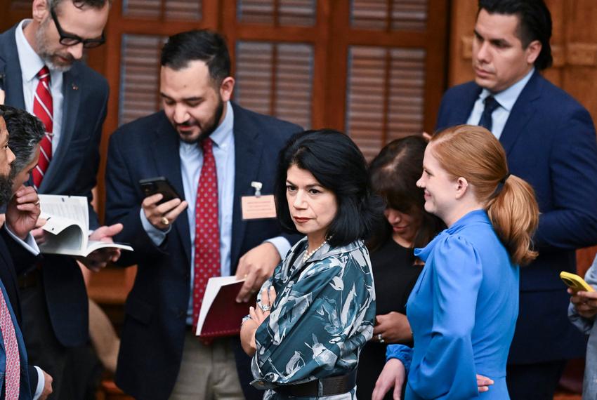 Sen. Carol Alvarado, D-Houston, with her staff on the Senate floor, moment before the final vote on HB 4 on August 22, 2025.