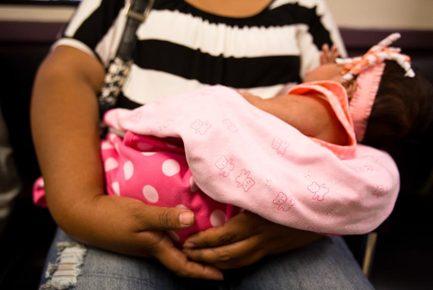 Patients wait to be seen at the People's Community Clinic in Austin, which provides state-subsidized women's health services to low-income women, in July 2014.