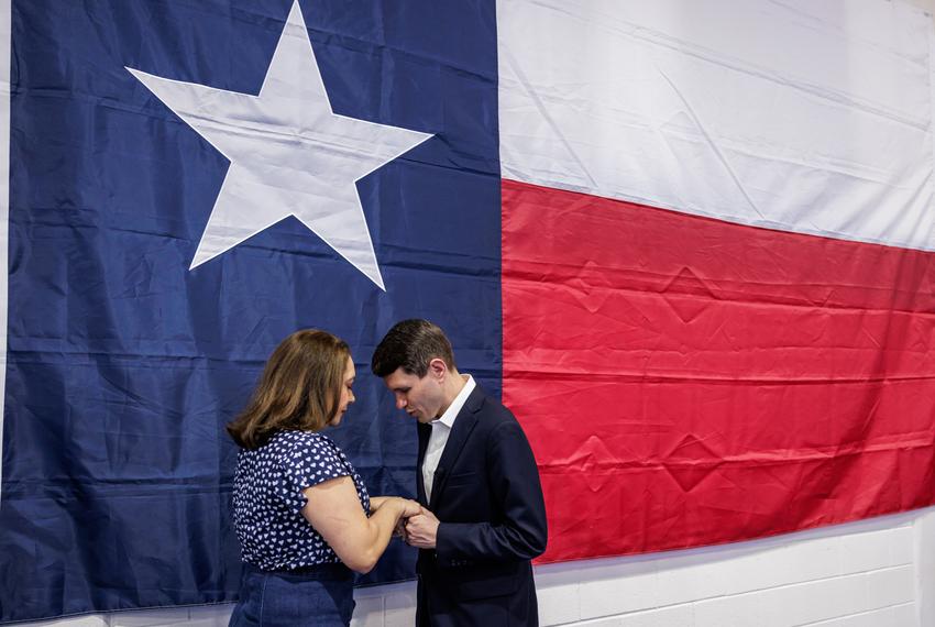 U.S. Senate candidate Texas Rep. James Talarico D-Austin prays for Lisa Sanchez, who is gearing up to run for public office for the first time, following a rally in McAllen on Sept. 27, 2025.