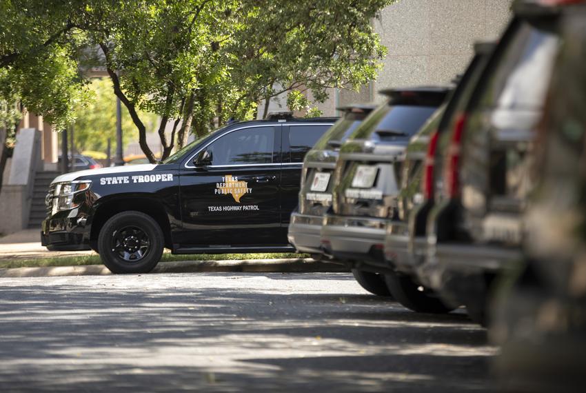 Texas Department of Public Safety vehicles outside of the state Capitol on Aug. 11, 2021.