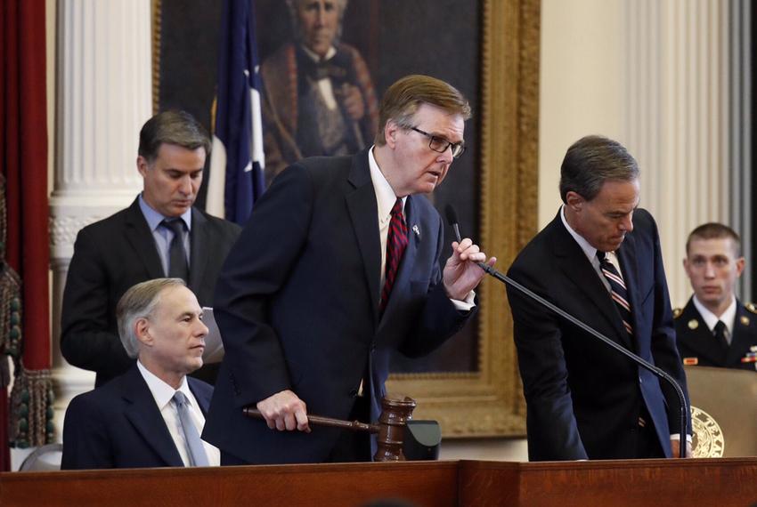 Gov. Greg Abbott, Lt. Gov. Dan Patrick and Speaker of the House Joe Straus on the dais in the House chamber for a joint session memorializing the nation's veterans, on May 27, 2017.