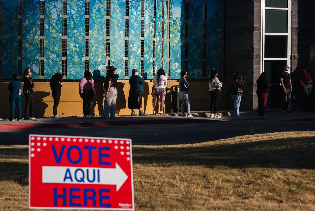 Voters wait in line to cast their ballots in the 2024 presidential election at the Esperanza Acosta Memorial Library in El Paso on Nov.5, 2025.