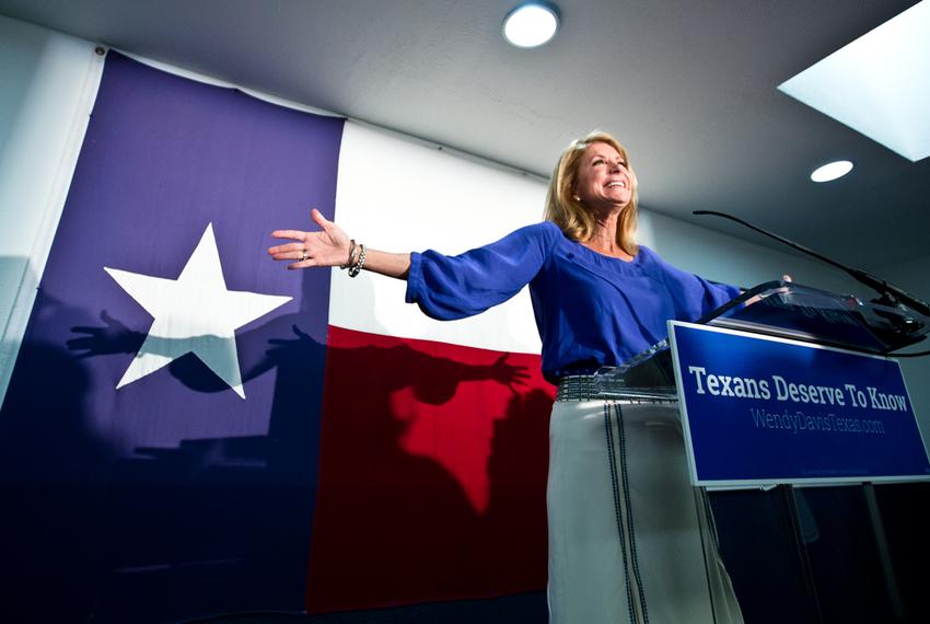 Gubernatorial candidate Wendy Davis addresses supporters before they canvass for her in East Austin.