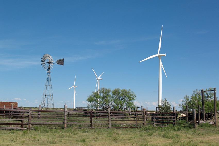 New turbines tower over an old windmill at the Whirlwind wind
farm, near Floydada