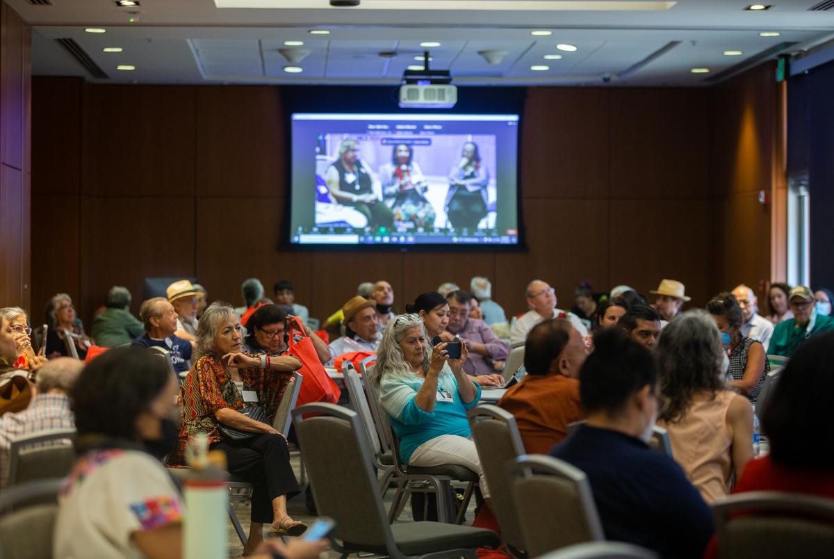 Audience members listen to Mujeres de La Raza Unida, a penel moderated by Rosie Castro, speak during the 50th anniversary reunion of La Raza Unida Party in San Antonio on Sept. 15, 2022.