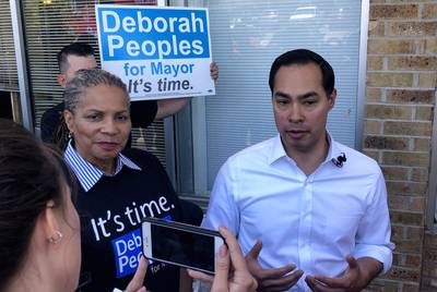 Chairman of the Tarrant County Democratic Party and mayoral candidate Deborah Peoples and presidential candidate Julián Castro talk to the press in Fort Worth on Saturday.