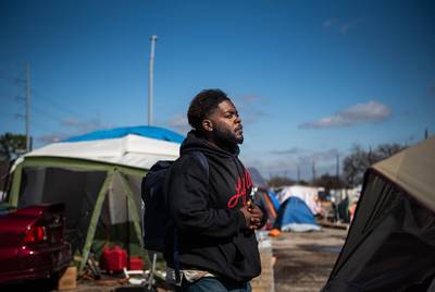 LaShawn Ramsey resides at the state-sanctioned homeless campsite in Austin.