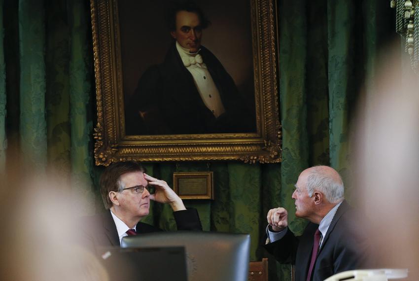 Lt. Gov. Dan Patrick meets privately with Sen. Kel Seliger, R-Amarillo, on the dais during a break in Senate proceedings Jan. 21, 2015.