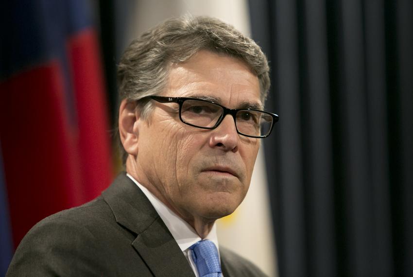 Gov. Rick Perry addresses media at a press conference following the unveiling of his official portrait at the Texas Capitol on May 6, 2016