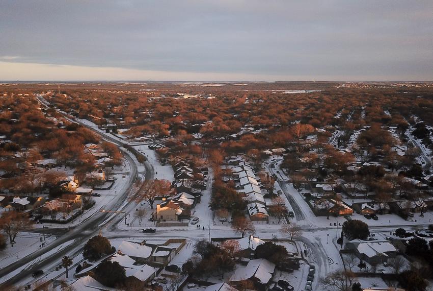 An eastern aerial view of Austin after a severe snowstorm dumped heavy snow and plummeted temperatures. Feb. 15, 2021.