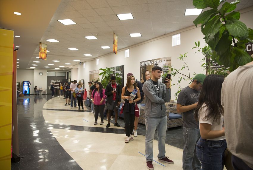 Voters line up to cast their ballot at the LBJ Student Center at Texas State University on Friday, Nov. 2, 2018.