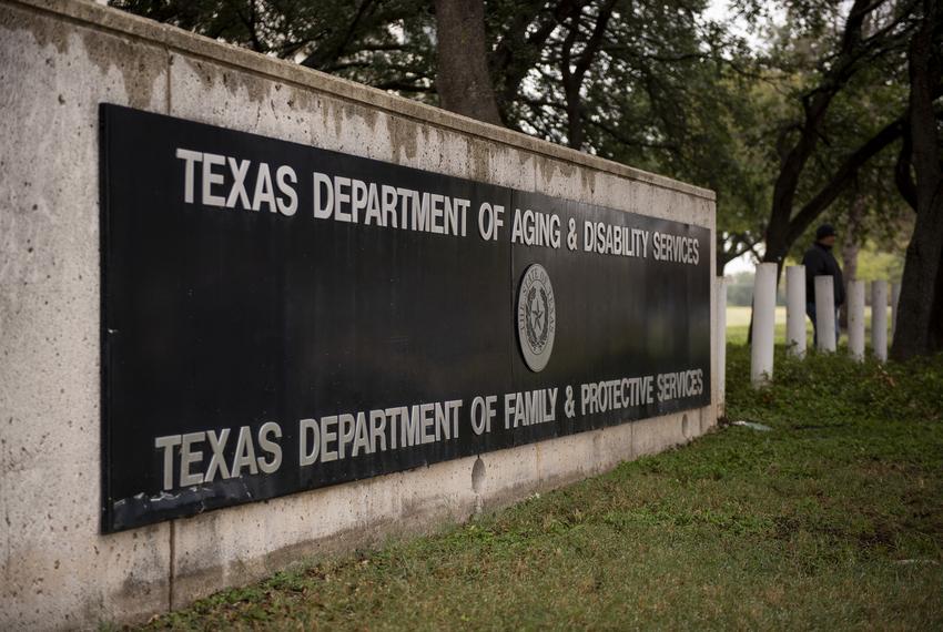 A sign for the Texas Department of Aging and Disability Services and the Texas Department of Family and Protective Services building in Austin on Nov. 14, 2019.