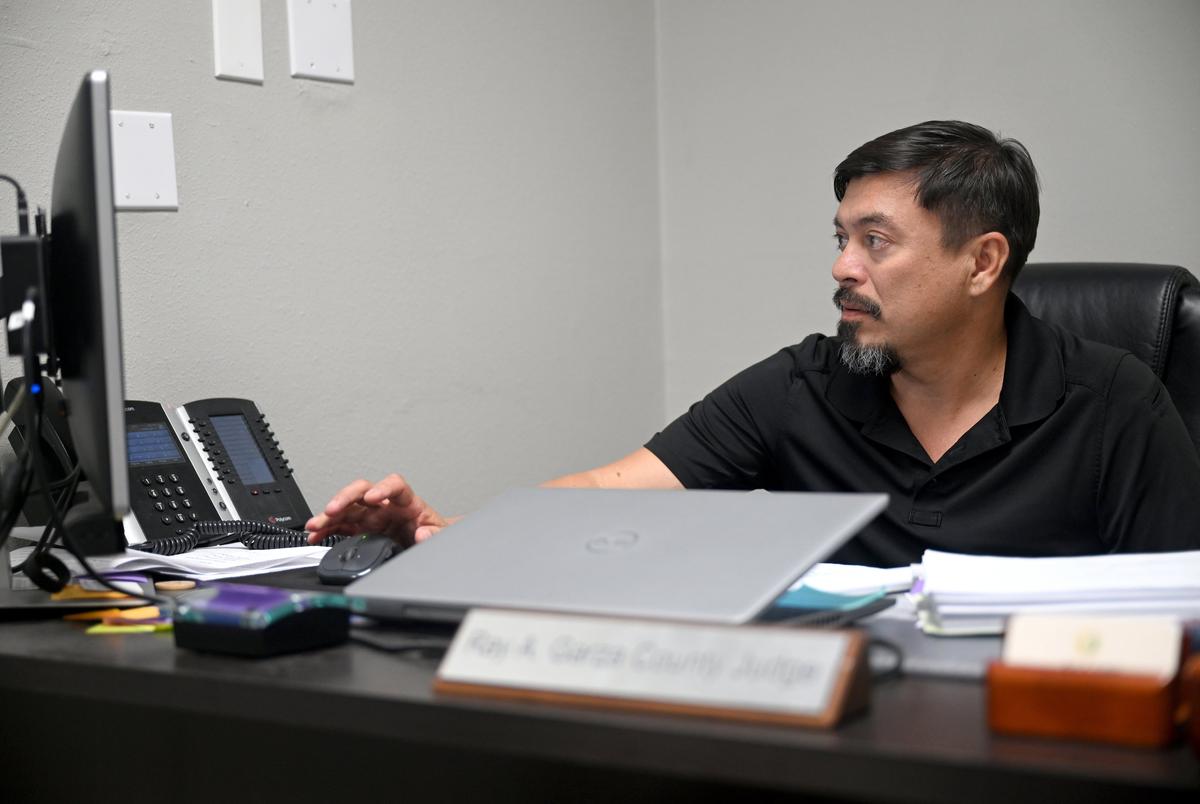 While construction on the county courthouse is being completed, Aransas County Judge Ray A. Garza has his office on a strip mall a few miles from the county building.