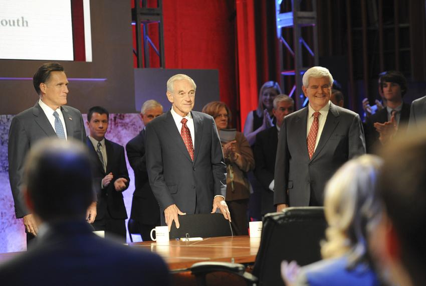 Mitt Romney, Ron Paul and Newt Gingrich at the Republican presidential debate at Dartmouth College on Oct. 11, 2011.