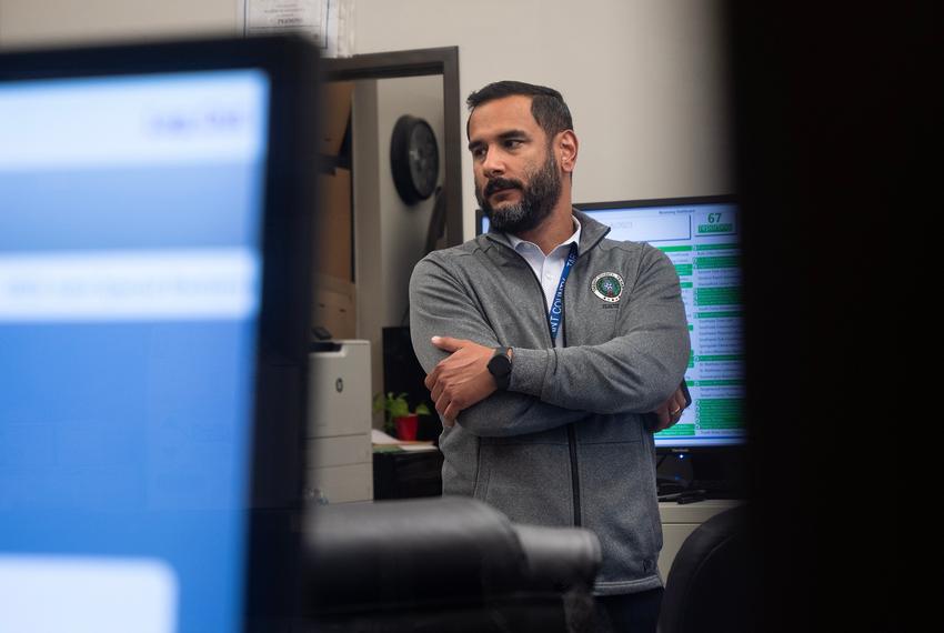 Tarrant County Elections Administrator Heider Garcia talks with ballot box workers inside the Tarrant County's central count station on election night. on May 6, 2023.