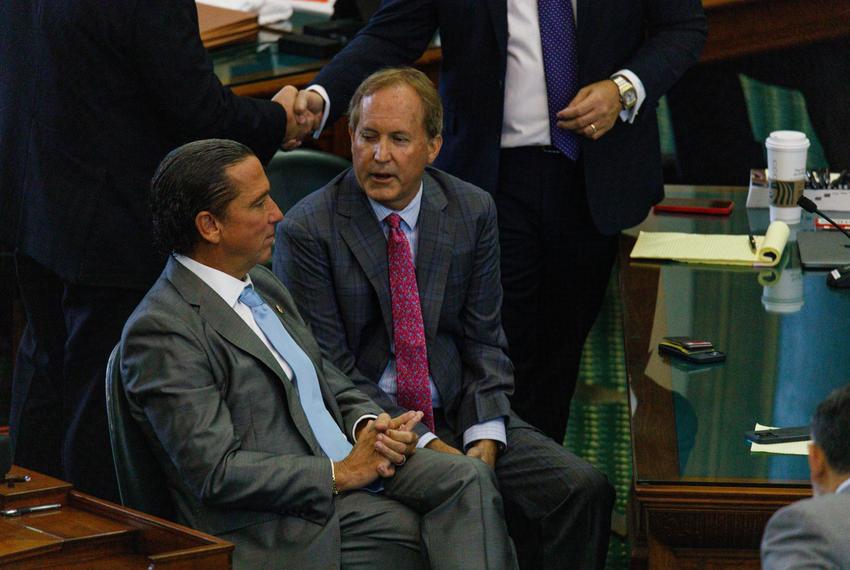 Attorney General Ken Paxton, right, sits with lawyer Tony Buzbee on the ninth day of Paxton’s’s impeachment trial at the Texas Capitol in Austin on Sept. 15, 2023.