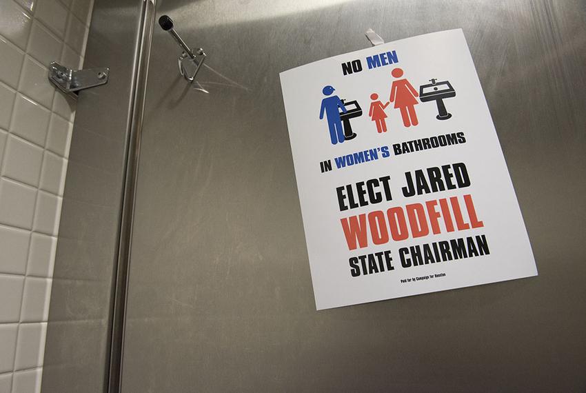 A sticker in the women's restroom at the Dallas Convention Center placed by the Jared Woodfill campaign on May 12, 2016