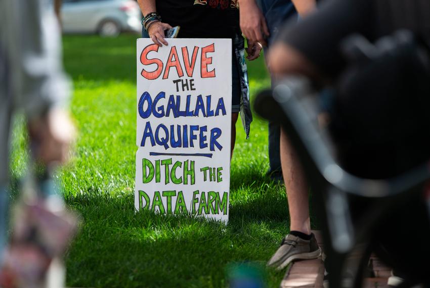 An attendee holds an anti data center protest sign at a town hall event in front of the Potter County Courthouse on Sept. 20. Sept. 20, 2025.