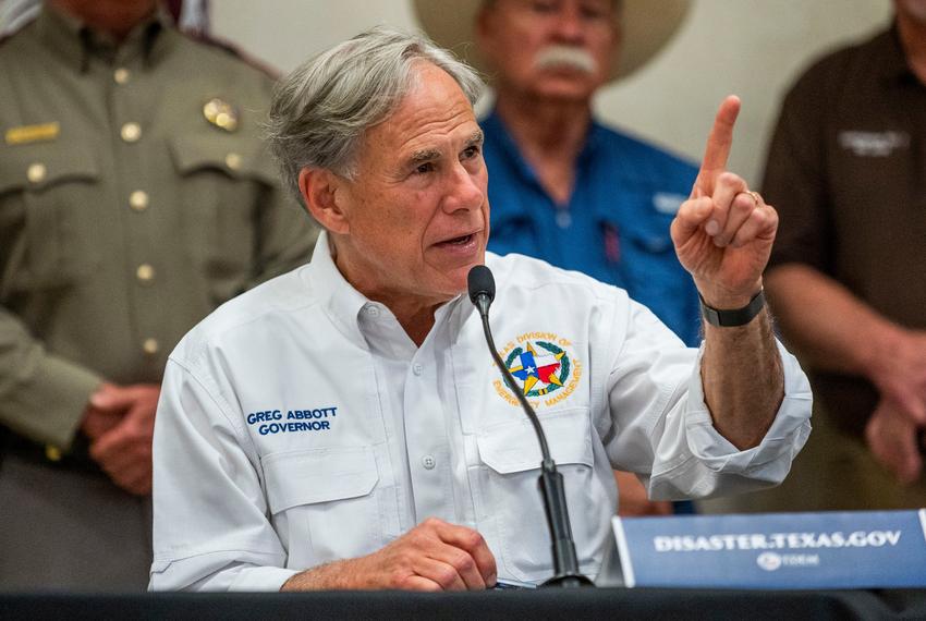 Gov. Greg Abbott responds to a reporter during a press conference at the Hill Country Youth Event Center in Kerrville on Saturday June 5, 2025.