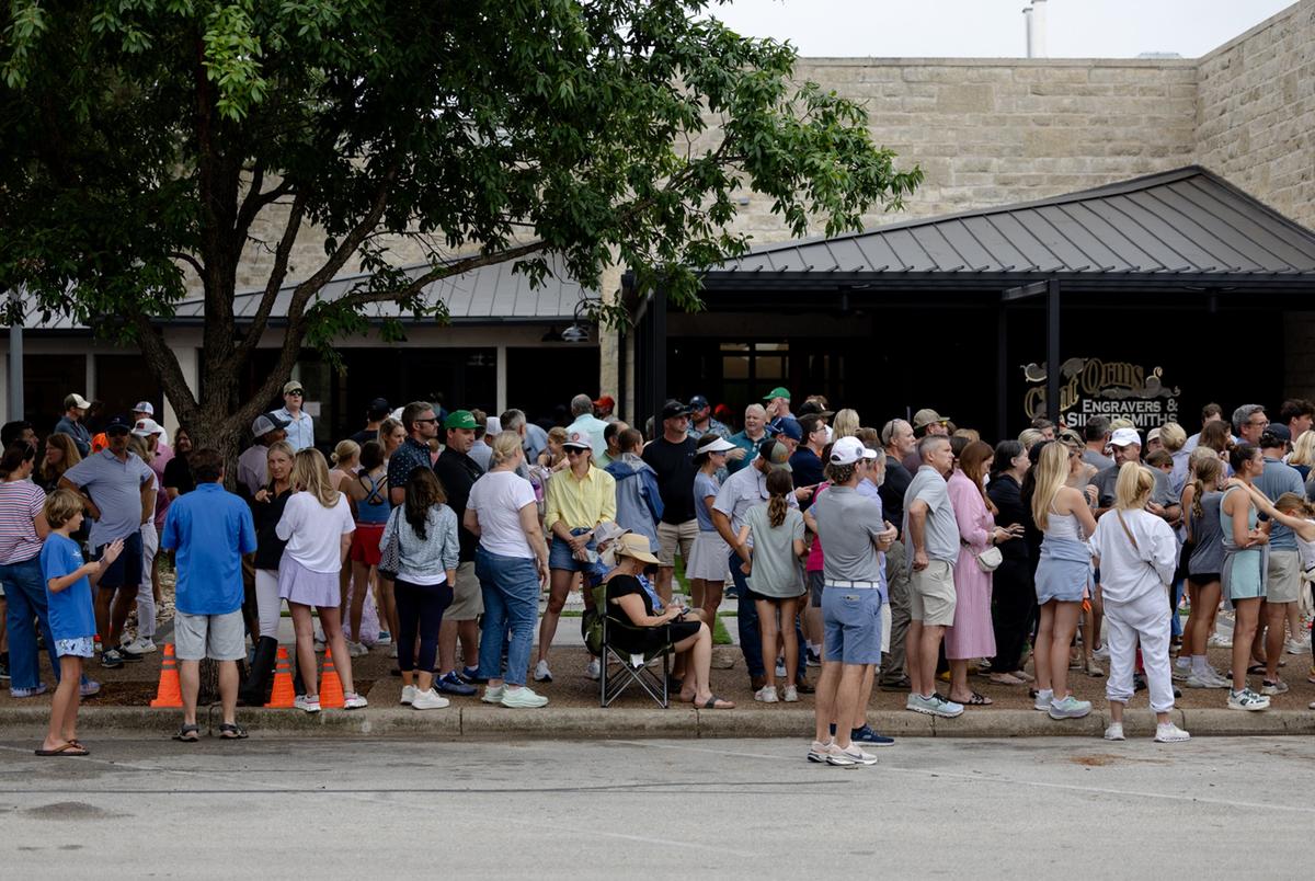 Campers from Camp Waldemar in Hunt are reunited with their families following a deadly flood at a reunification center at the Arcadia Live Theatre in Kerrville, Texas on July 5, 2025.