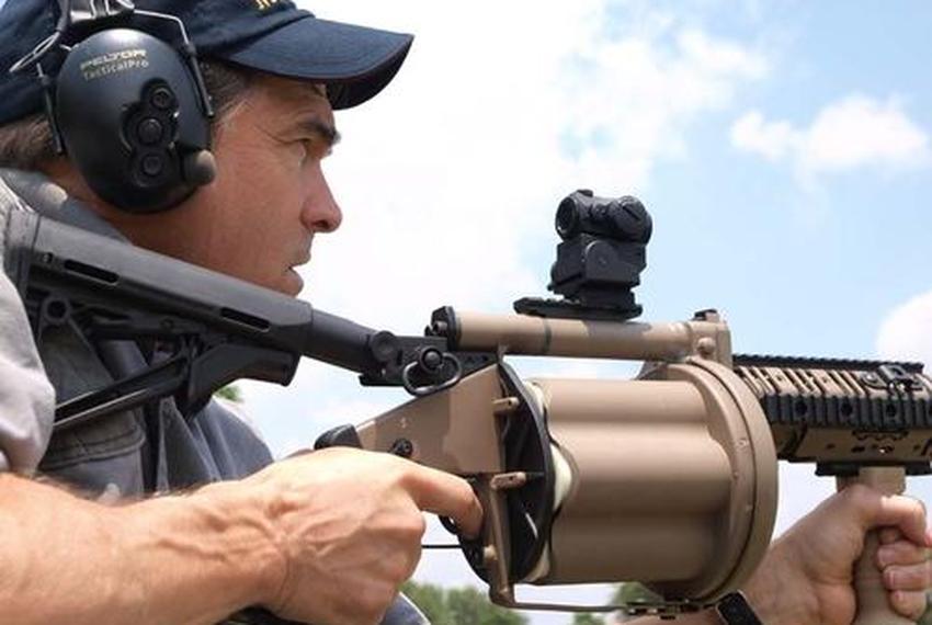 Gov. Perry fires an M-32 grenade launcher.