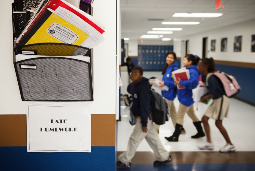 Students enter the classroom of a Houston elementary school.