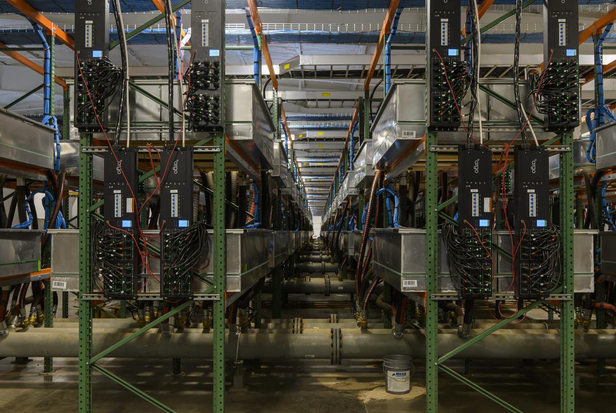 Pods full of computers that are submerged in fluid at the crypto mining facility, Helios, near Afton, on Sept. 15, 2022. The fluid keeps the computers well under manufacturer-designed temps to avoid overheating.