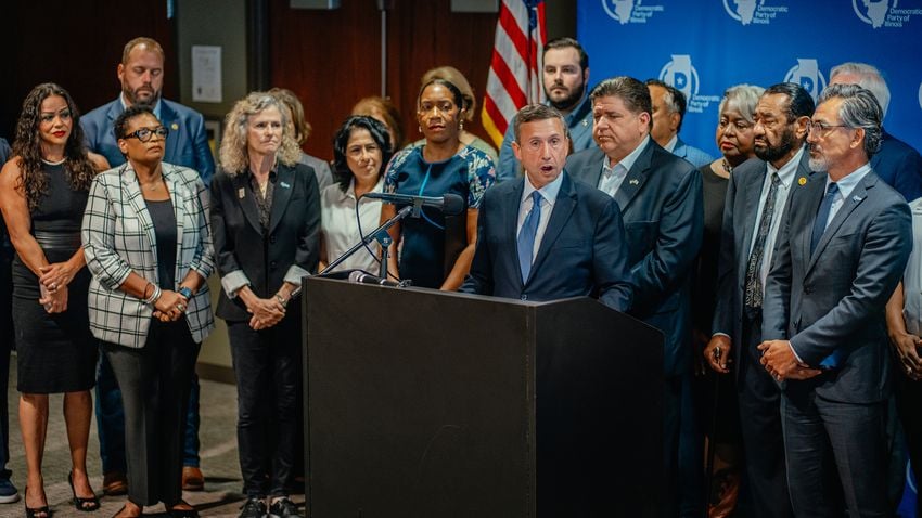 Democratic National Committee Chair Ken Martin speaks during a press conference surrounded by members of the Texas House Democratic Caucus at Painters District Council 30 in Aurora, Ill., on Tuesday, Aug. 5, 2025.