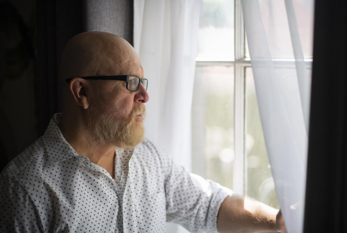 Tomas Garcia looks out of his home in Houston on Sept. 8, 2021.