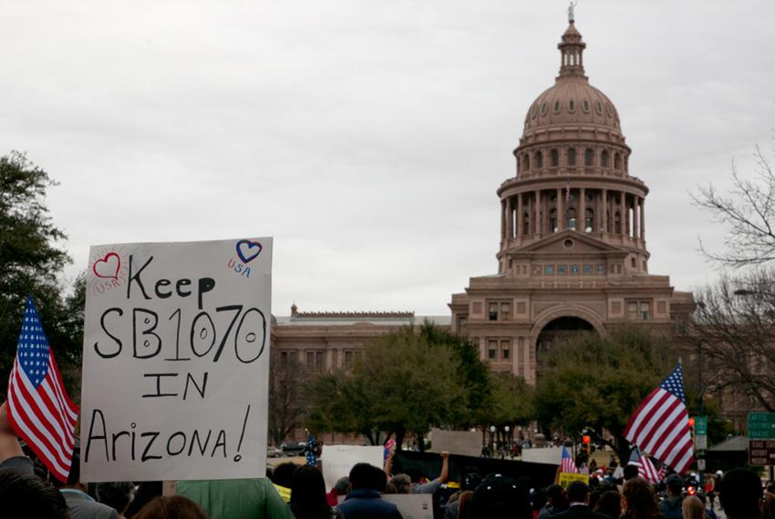 Protesters march down Congress avenue towards to the Capitol for the Immigration rally on Feb 22, 2010.