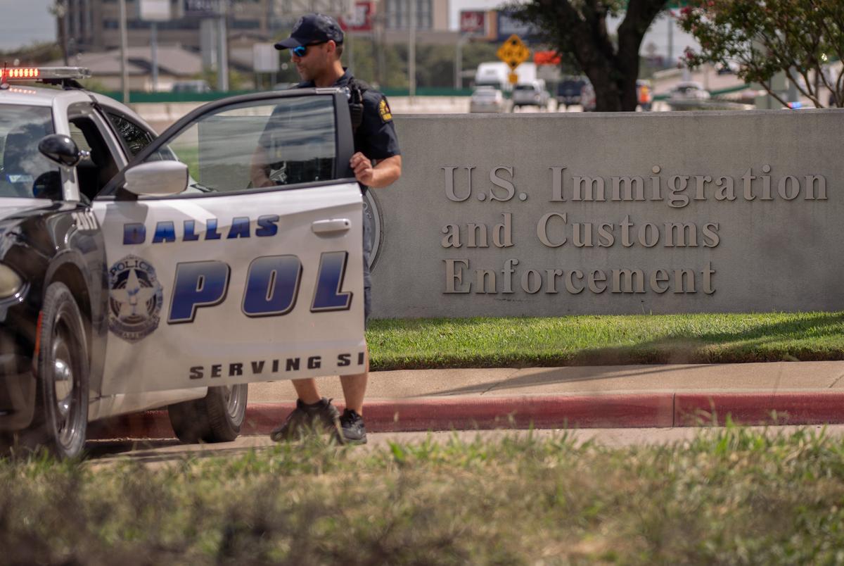 Dallas police outside the U.S. Immigration and Customs Enforcement facility in Dallas where three migrants were shot on September 24, 2025. A second victim died, bringing the death toll, including the shooter, who killed himself, to three.