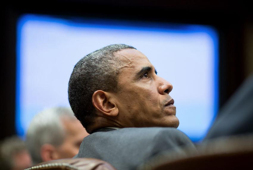 President Barack Obama meets with advisors in the Roosevelt Room of the White House, Aug. 4, 2014.