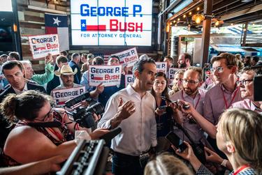 Texas Land Commissioner George P. Bush speaks to members of the media after announcing his candidacy for Texas Attorney General at an event inside Buford's Bar in Austin on June 2, 2021.