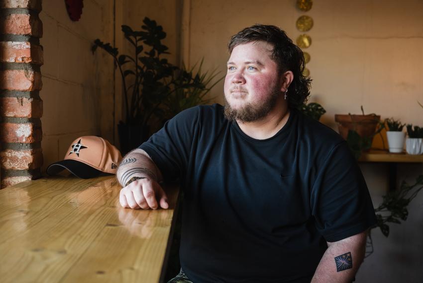 Diana R. Garland School of Social Work at Baylor University graduate AB Waters poses for a portrait on June 10, 2025 in Waco, Texas. AB has worked to make Baylor University more inclusive of LGTBQIA+ students. Justin Hamel/ the Waco Bridge/ Report For America/ CatchLight Local