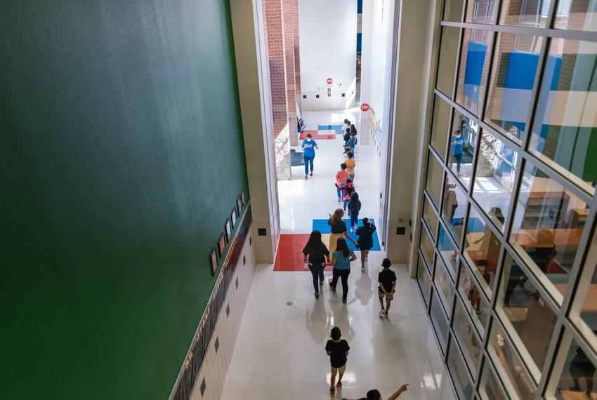 Students and teachers walk between classes at Blanco Vista Elementary School in San Marcos on Monday August, 23, 2021.