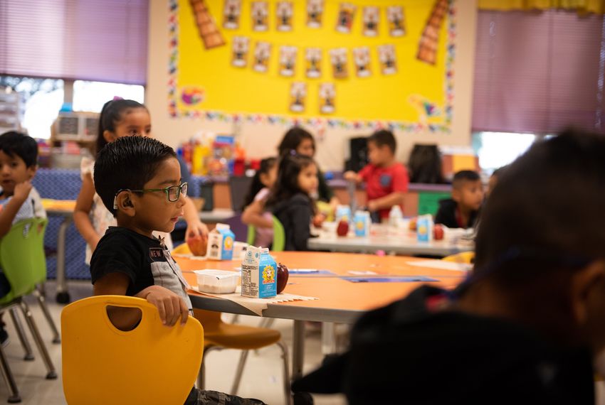 Tayden, along with the rest of the classroom, watches the students walk in as JoAnn Zavala welcomes them in on Sept 5, 2019 at Hemphill Elementary.