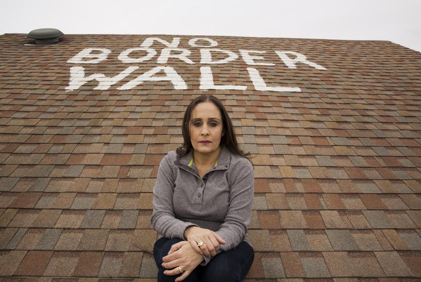 Naida Alvarez painted "no border wall" on the roof of her home in La Rosita, Texas. Alvarez has received letters from the US Government stating her land as a potential location for the Border Wall