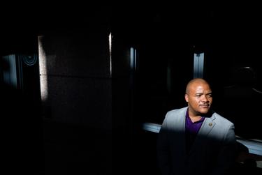 State Rep. Venton Jones, HD-100, stands in the open-air rotunda, a few steps away from his office in the state Capitol's extension in Austin on Jan. 19, 2023.