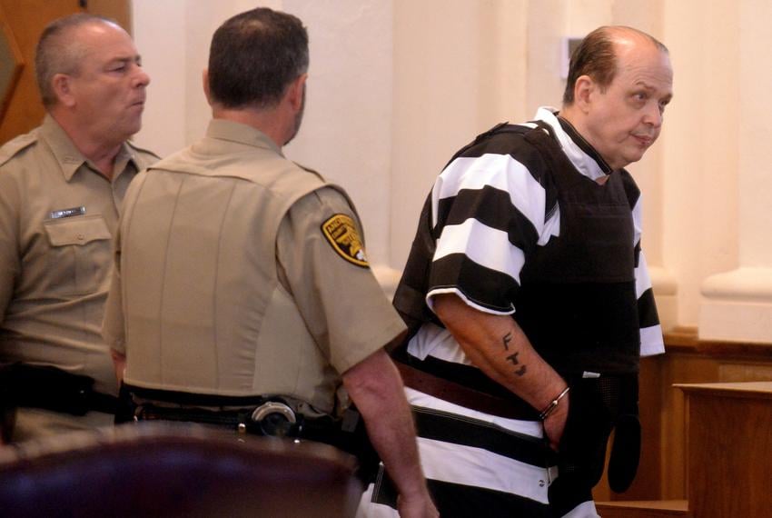 Shackled and chained, Robert Roberson is led into court by Anderson County Sheriff’s Office deputies on July 16, 2025. A new execution date of Oct. 16, 2025 was set by presiding Judge Austin Jackson of Smith County at the Anderson County Courthouse in Palestine.