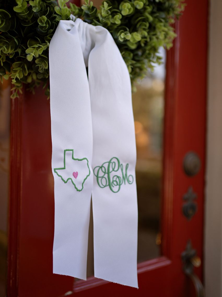 A wreath with Chloe Childress’ initials hangs on the front door of the Childress’ home in Houston, Texas, on September 11, 2025. Chloe was a camp counselor at Camp Mystic and passed away in the July 4 Kerr County floods along with a fellow co-counselor and 25 others at the camp. 

In the wake of the tragedy, Matthew and Wendie Childress, Chloe’s parents, have advocated for tighter camp safety regulations, culminating in a recent bill signed by Texas Governor Greg Abbott, “Heaven's 27 Camp Safety Act,” in honor of the 27 lives lost.