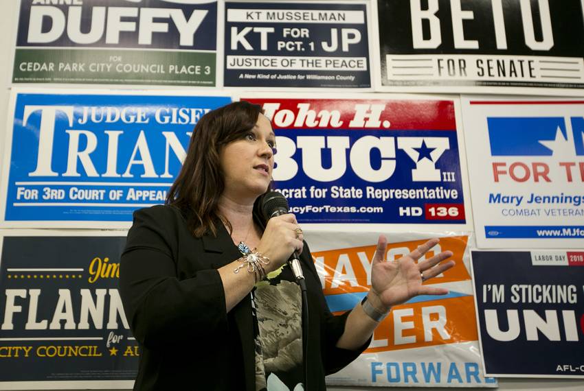 Democratic nominee for the 31st Texas congressional district, MJ Hegar speaks to supporters and volunteers at an early vote rally at her field office in Austin, Texas on October 25, 2018