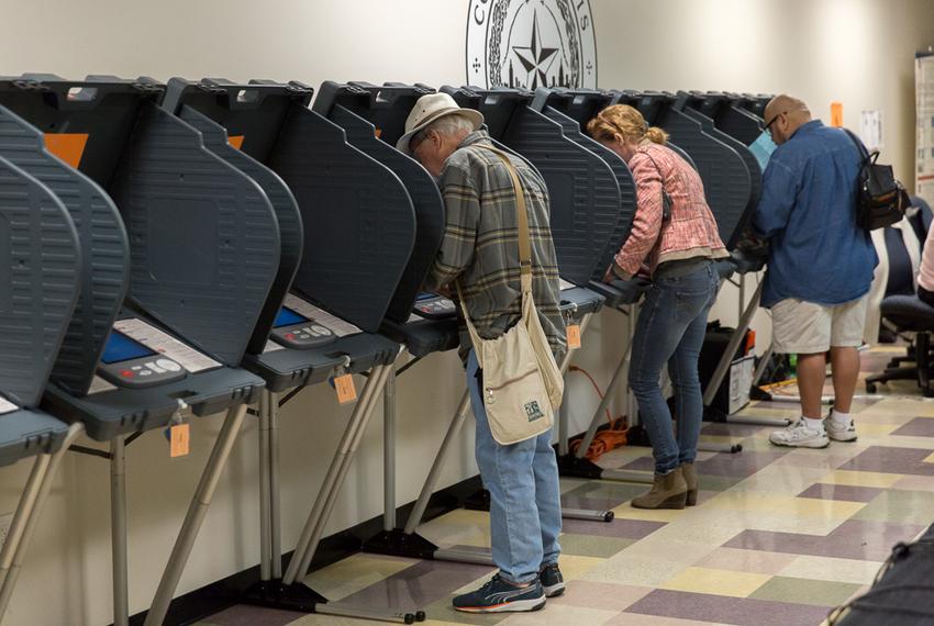 Travis County voters cast ballots at Travis County Tax Office on Feb. 25, 2016.