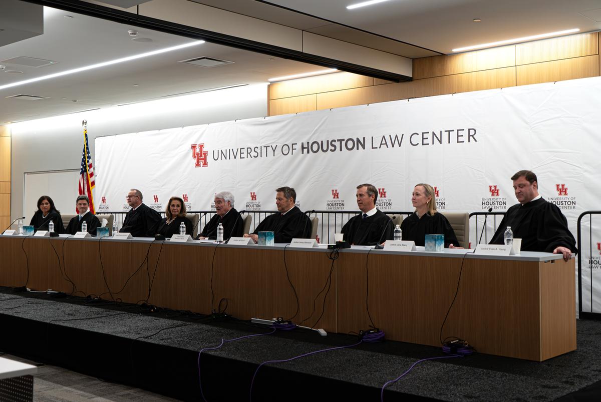 Supreme Court of Texas justices sit at the bench for a Q & A after hearing oral arguments for two civil cases at the University of Houston Law Center in Houston on Oct. 29, 2024.